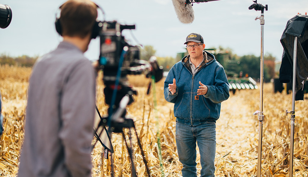 Andrew McCrea in a Field during Harvest